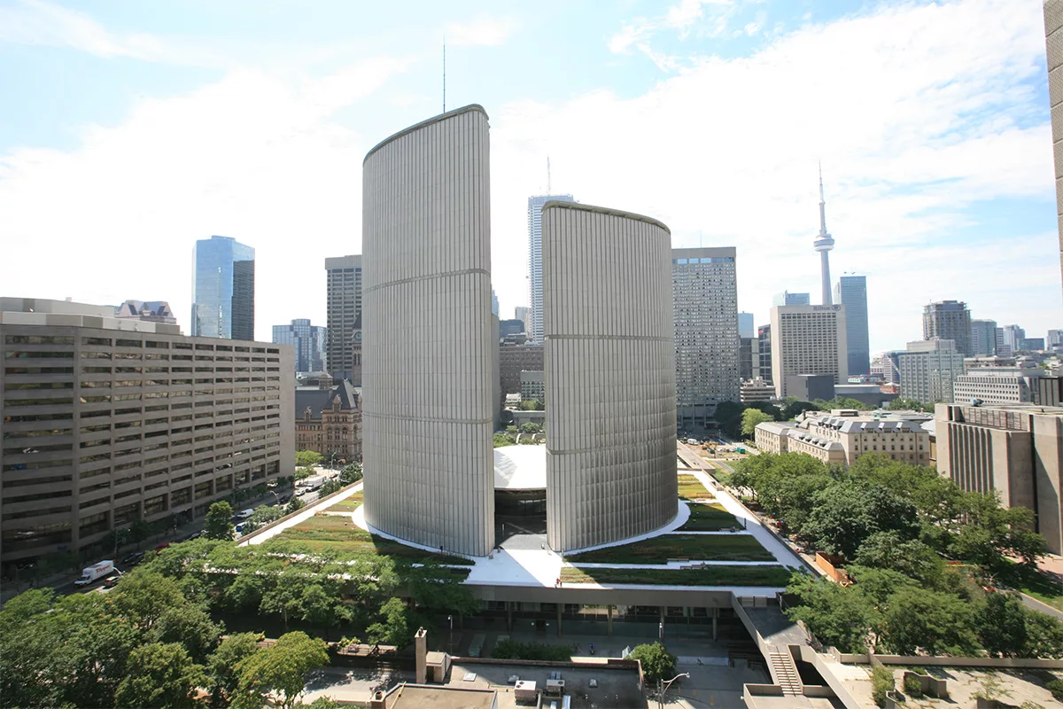Building with green roofs surrounding in the city of Toronto.