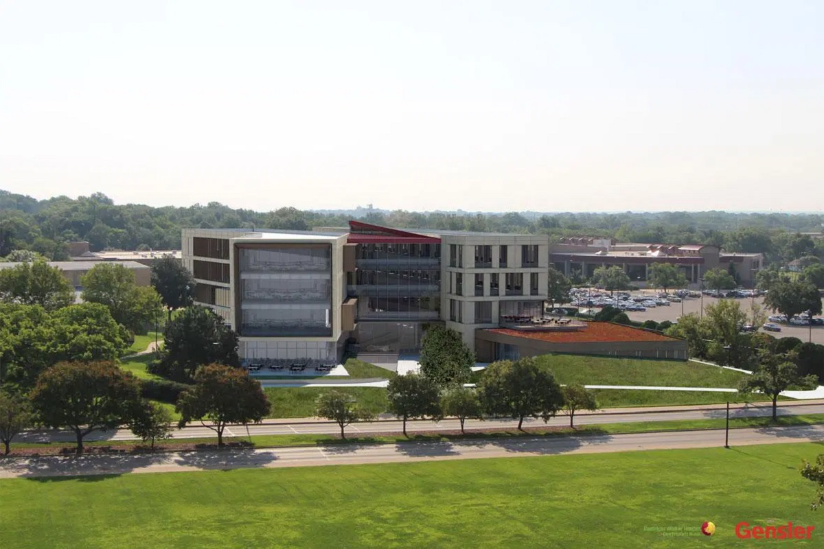 A view of the exterior of the Kansas University School of Business on a sunny day.